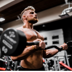 Human Design Gate 46 - The Love of The Body - man doing fitness