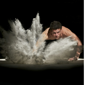 Man using Willpower to smash the ground and create a dust storm